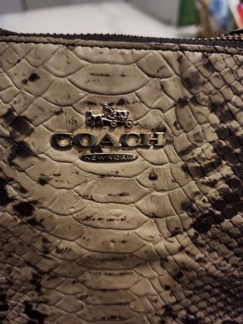 does coach use real or imitation snakeskin for their purses
